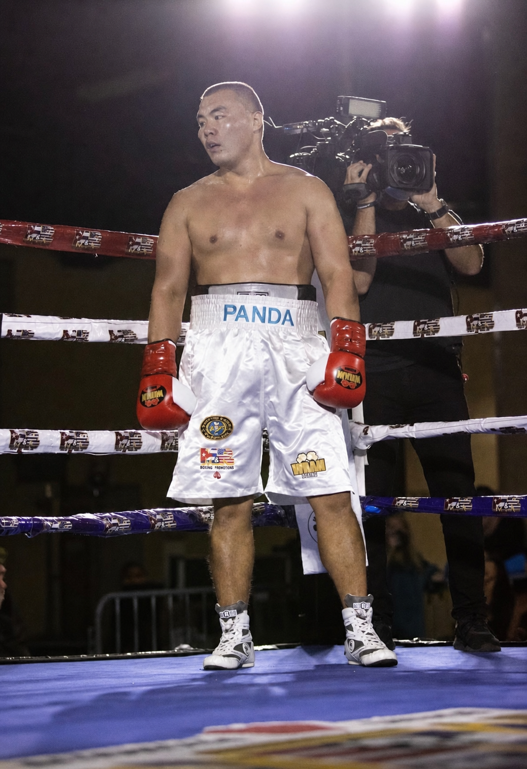 Serik 'Panda' Musadilov standing in the ring before a fight
